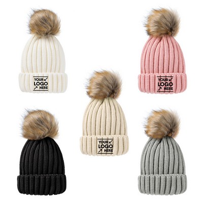 Stay Cozy And Fashionable With Our Faux Fur Pom Beanie