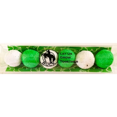 Eco-Friendly Wildflower Seed Bombs with Four Leaf Clover Background