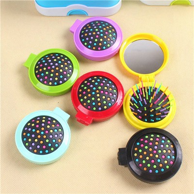 Compact Pop-Up Brush with Mirror